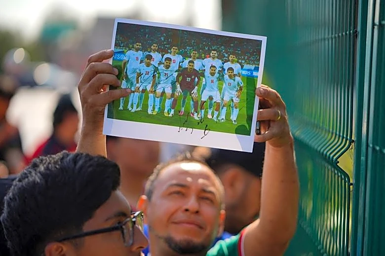 Soccer-Iran squad get cheerful Tijuana send off ahead of World Cup opener in Los Angeles