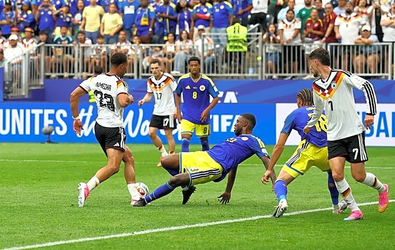 Soccer-Germany cruise to 7-1 win over debutants Curacao in Houston