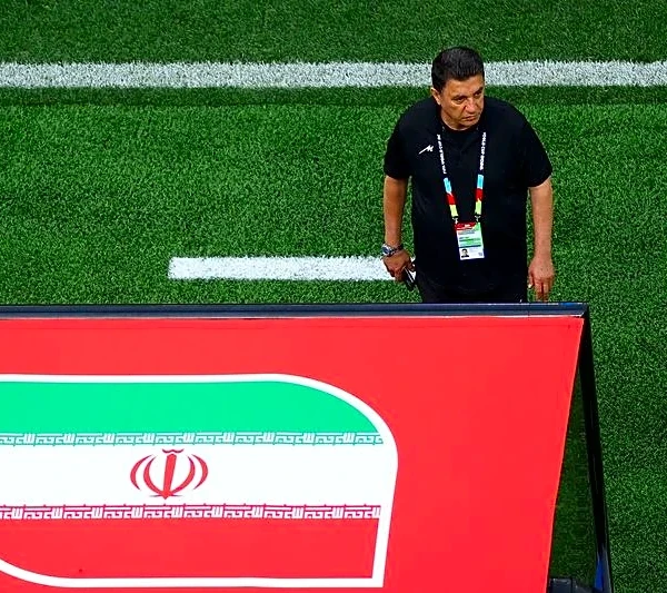 Soccer-Iran's manager, striker pledge to play for all Iranians despite protests