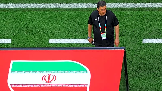 Soccer-Iran's manager, striker pledge to play for all Iranians despite protests