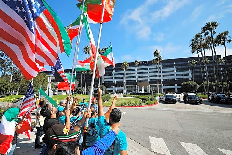 Iranian Americans plan protests as soccer team prepare for their World Cup opener