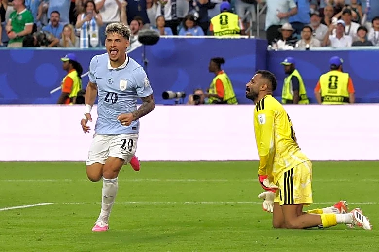 Soccer-Araujo equaliser saves Uruguay's blushes in draw with Saudis