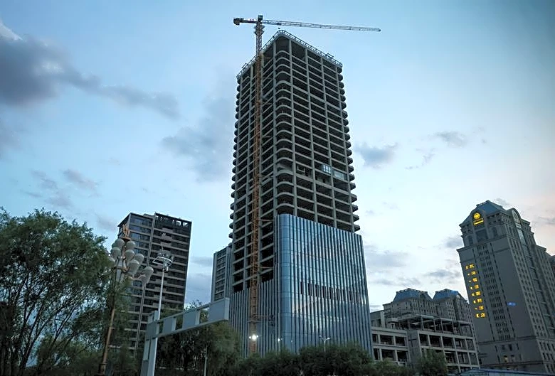 China's new home prices fall at faster pace in May on soft demand