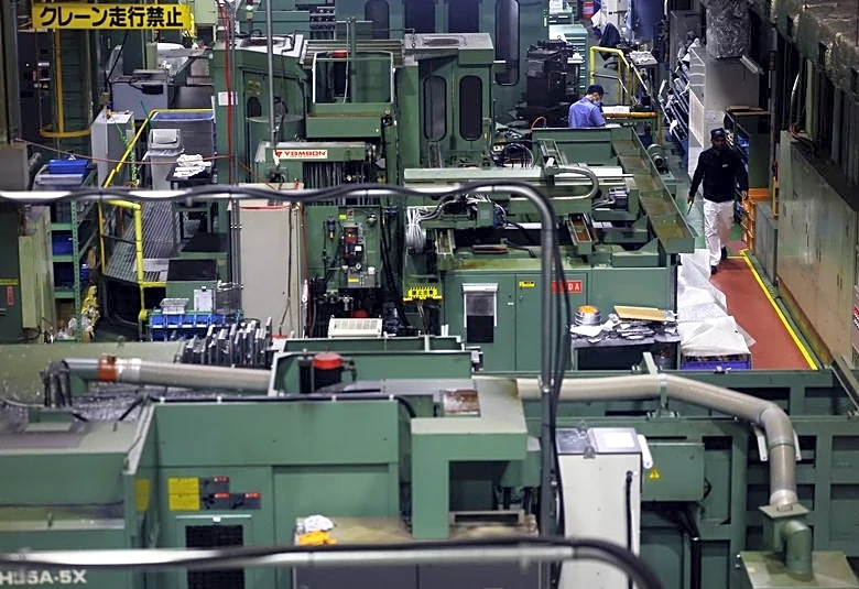 Japan manufacturers' sentiment rises for second month on chip-driven demand: Reuters Poll