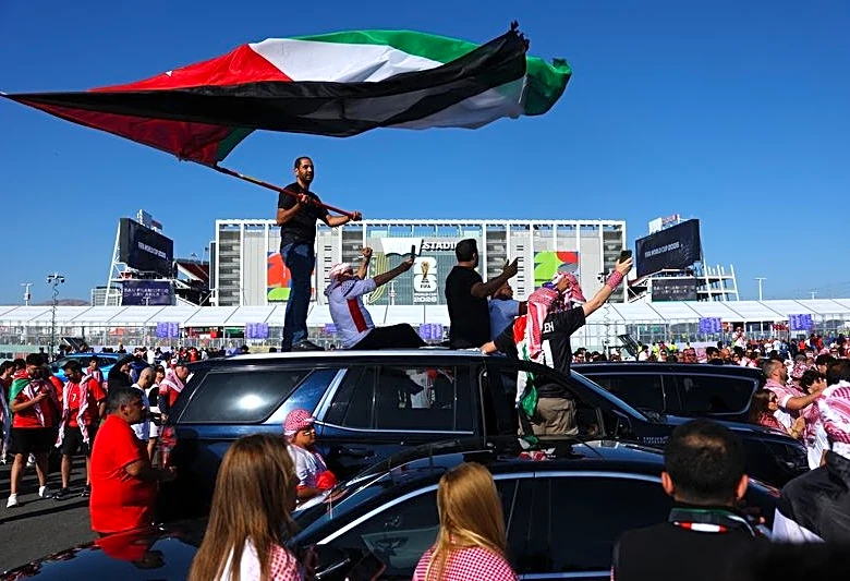 Soccer-Road-tripping Jordan fans hail World Cup debut