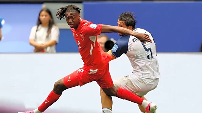 Soccer-Swiss wonderkid Manzambi dazzles in World Cup win
