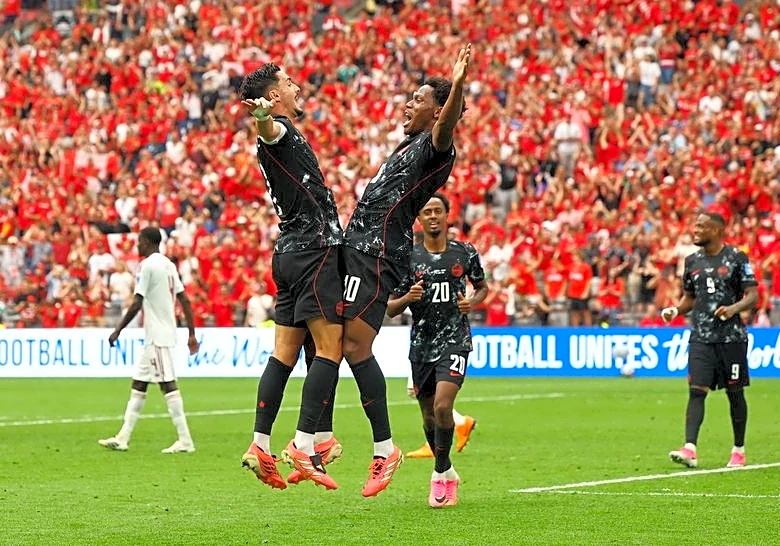 Soccer-David hat-trick as Canada crush nine-man Qatar 6-0 to earn first World Cup finals win