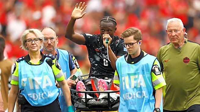 Soccer-Kone's broken leg casts shadow over Canada's historic World Cup win