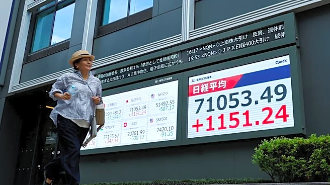 Stocks set records in Japan, South Korea; dollar gets Fed boost