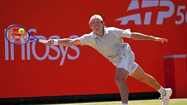 Tennis-De Minaur knocked out in quarter-finals at Queen's Club