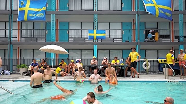 Soccer-Midsummer madness: Swedish and Dutch fans party before World Cup clash