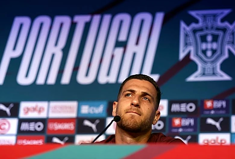 Soccer-Dalot hits back at Portugal critics, defends Ronaldo