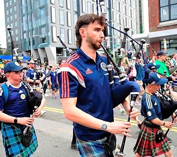 Soccer-Bye Bye Boston: Scotland's Tartan Army bids farewell to sleepless city
