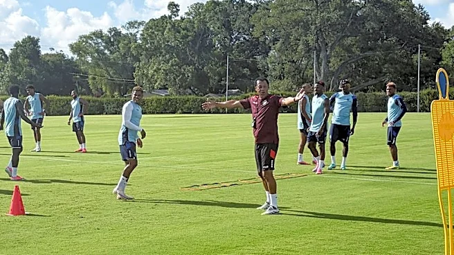 Soccer-Spain shock and Vozinha fame, but all still chill in camp Cape Verde