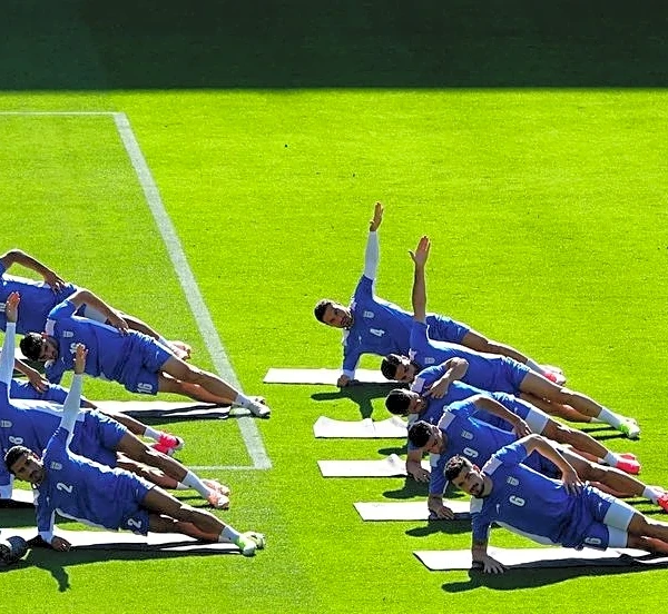 Soccer-Iran coach questions inconsistency as preparation for Belgium match cut short