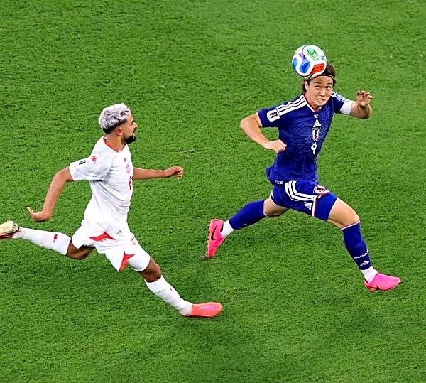 Soccer-Japan rout Tunisia 4-0 as Ueda shines in World Cup's 1,000th match