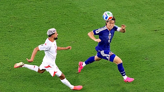 Soccer-Japan rout Tunisia 4-0 as Ueda shines in World Cup's 1,000th match