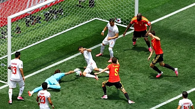 Soccer-Beiranvand heroics help Iran hold 10-man Belgium to goalless draw