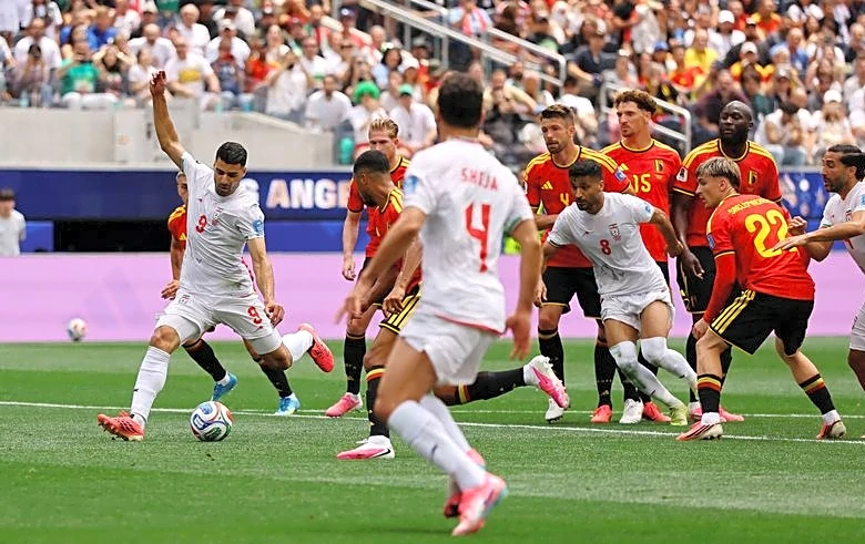 Soccer-Iran coach says unbeaten World Cup start will be remembered in history