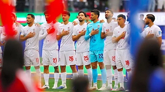 Soccer-Iran draw strength from adversity after holding Belgium to draw
