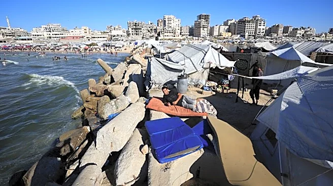 Gazans flee scorching tents for a polluted sea