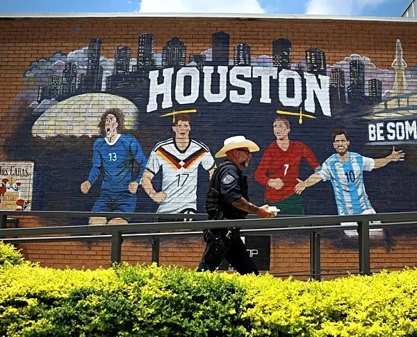 Soccer-Local World Cup fans wave many flags in multicultural Houston