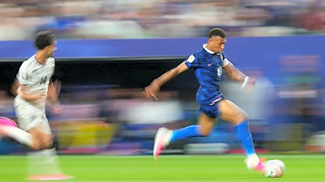 Soccer-Mbappe double sends France into knockout rounds after lengthy weather delay
