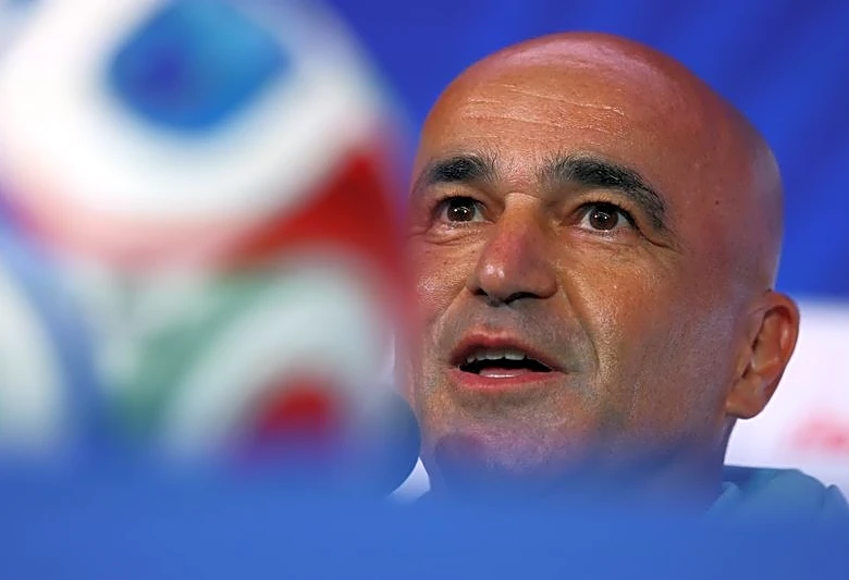 Soccer-Portugal feeling no pressure ahead of Uzbekistan match, Martinez says