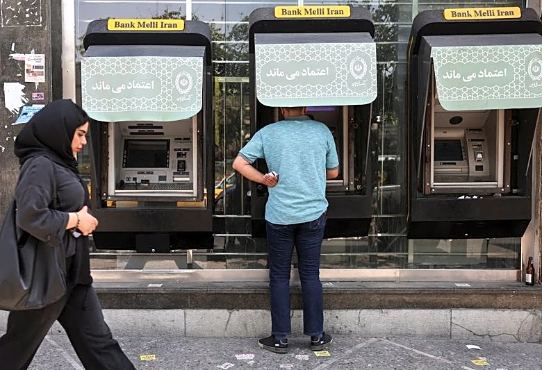 Iran says card-based banking hit by cyberattack on three lenders