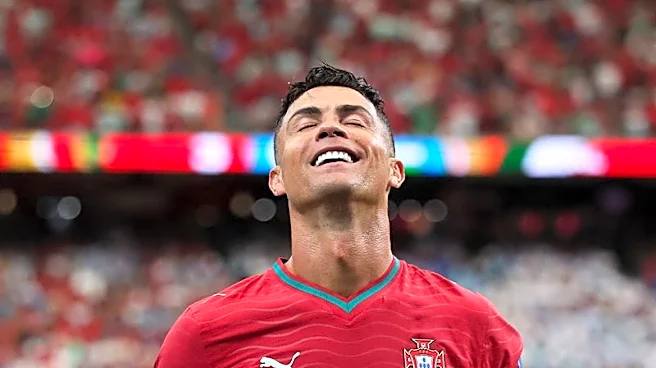 Soccer-'I'm back': Record-breaker Ronaldo fires Portugal to 5-0 win over Uzbekistan