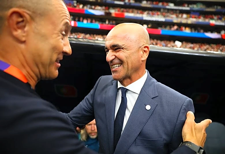Soccer-Portugal played with heads not hearts against Uzbekistan, coach says