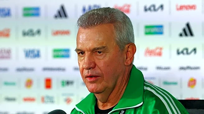 Soccer-Coach Aguirre unsatisfied with Mexico's performance despite perfect World Cup start