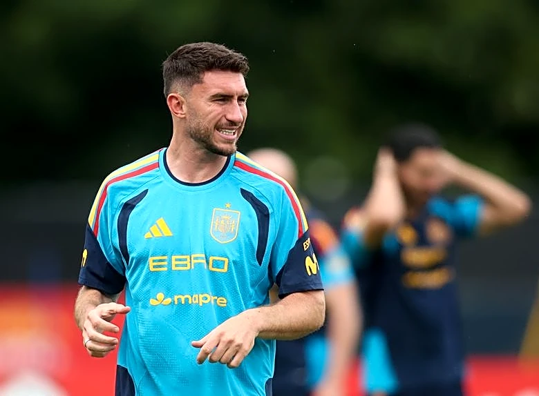Soccer-Unbeaten Spain ready for whatever Uruguay throw at them, Laporte says