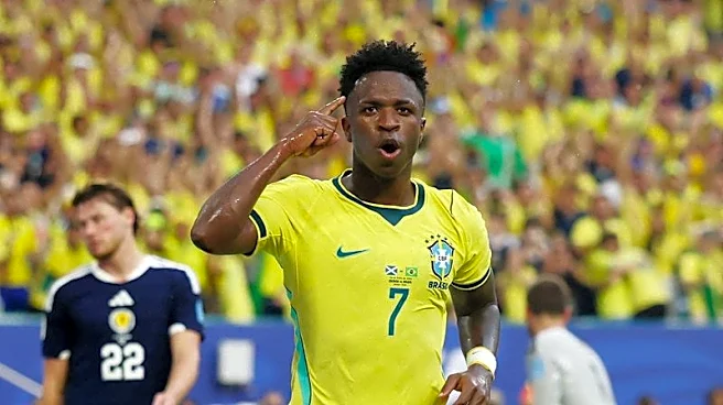 Soccer-Vinicius fires Brazil into World Cup knockouts with 3-0 win over Scotland