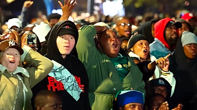 Soccer-South Africans pour onto streets in pyjamas to celebrate World Cup feat