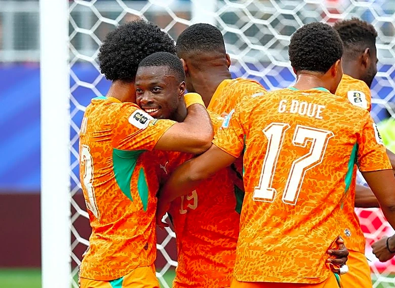 Soccer-Ivory Coast advance as Pepe scores twice to send Curacao home