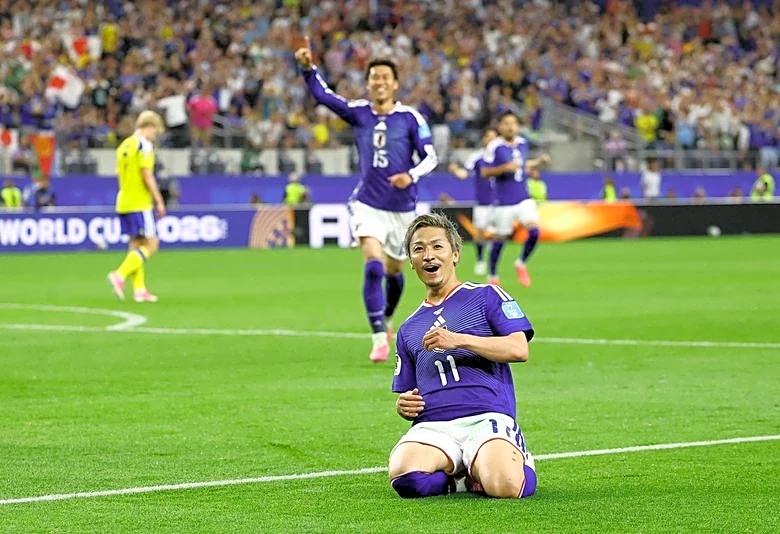 Soccer-Japan draw 1-1 with Sweden to finish second in Group F