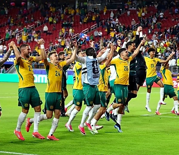 Soccer-Australia reach World Cup knockouts after goalless draw with Paraguay