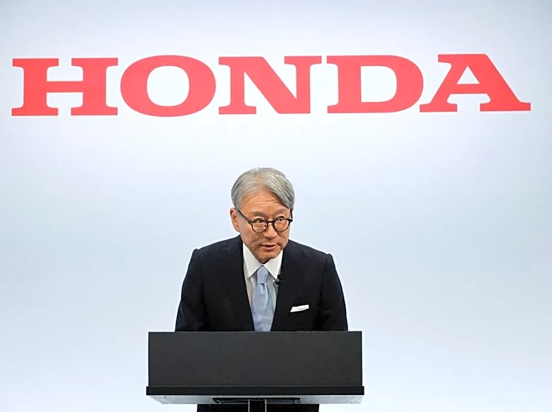 Honda CEO apologises for company's loss, wins investor backing at annual meeting