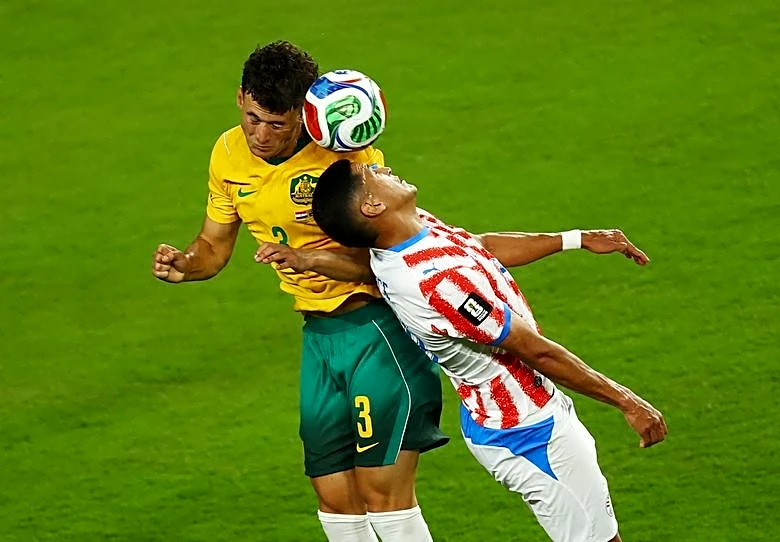 Soccer-After goals galore at World Cup, Paraguay and Australia serve up a snoozefest