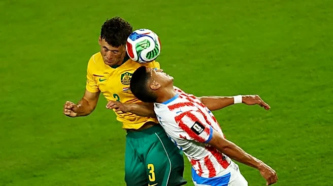 Soccer-After goals galore at World Cup, Paraguay and Australia serve up a snoozefest