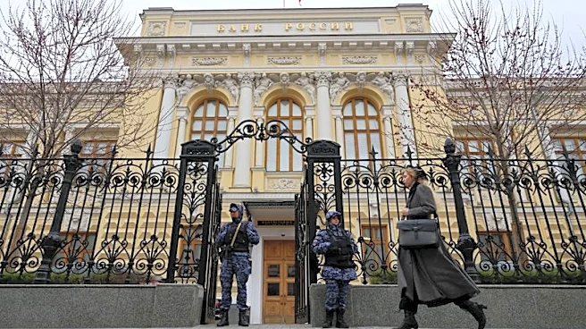 Central bank sees no need for extra measures as worried Russians withdraw cash
