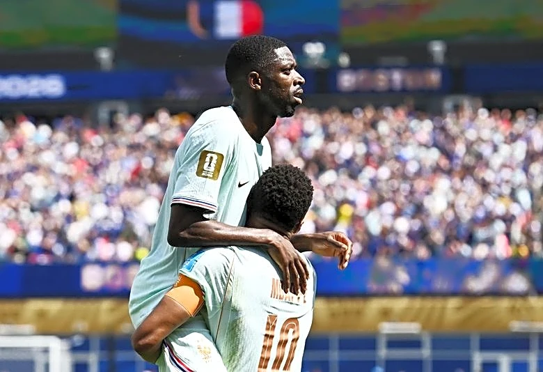 Soccer-France's Dembele steals the show with 25-minute hat-trick against Norway