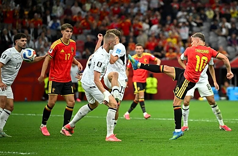 Soccer-Trossard double fires Belgium into World Cup knockouts with 5-1 rout of New Zealand