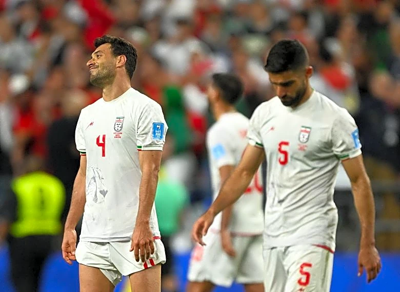 Soccer-In Seattle thank-you note, Iran express frustrations over draw with Egypt