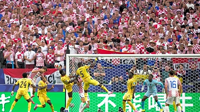 Soccer-Vlasic header sends Croatia into World Cup knockouts with 2-1 win over Ghana
