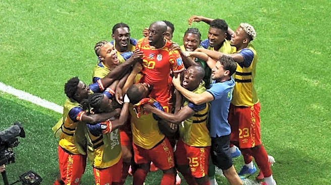 Soccer-DR Congo seal place in World Cup knockouts with comeback win over Uzbekistan