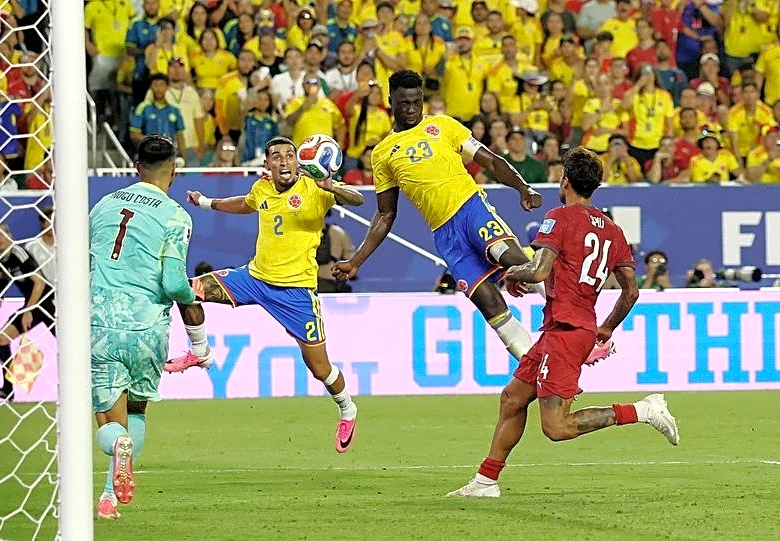 Soccer-Colombia and Portugal advance after no-bore draw in Miami