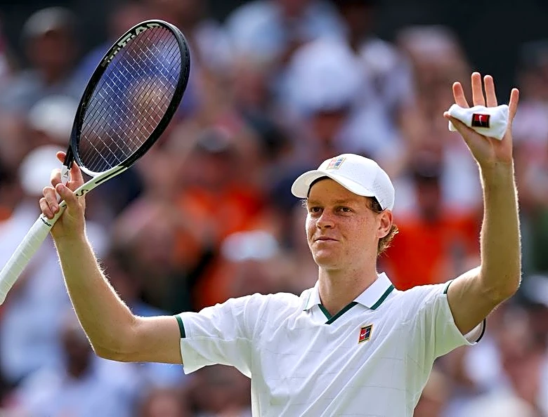 Tennis-Stretched Sinner overcomes Kecmanovic to begin Wimbledon title defence