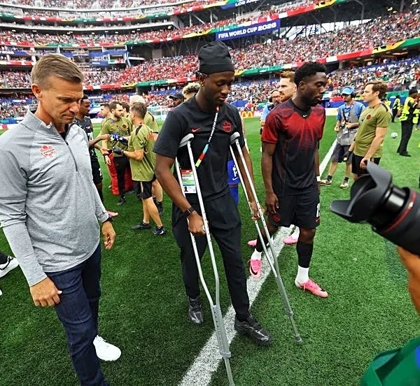Soccer-Injured Kone leads Canada celebrations after historic last-16 World Cup berth